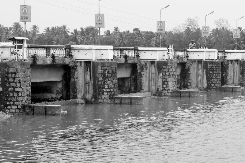Thottapally spillway in Alappuzha district, Kerala that helps to enable speedy diversion of monsoon flows of Achencoil, Pamba, Manimala and Meenachil rivers in order to reduce flooding in the agricultural lands of Kuttanad